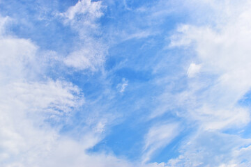 Fototapeta premium beautiful blue sky and white fluffy group of clouds with sunrise in the morning, natural background