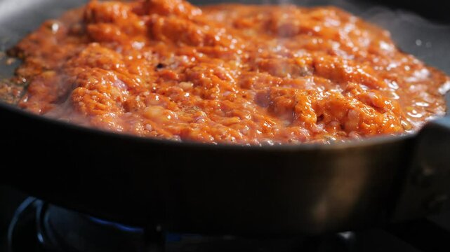 Mexican chorizo cooking in a skillet 