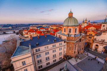 Fototapeta premium View of the city of Prague castle in hradcany and the Vltava river with Charles bridge from Old Town Bridge Tower in Prague, Czech Republic.