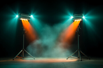 Stage lights casting colorful beams in a misty setting, creating a dramatic atmosphere for performances or events.