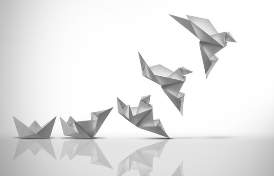 Personal Development Concept and growth strategy or corporate model innovation as a motivational metaphor for growing success from simple to complex as origami boats.