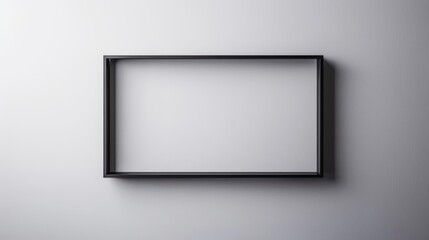Black frame on white wall with copy space.