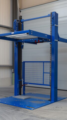 Naklejka premium An industrial freight elevator platform used for handling cargo or manned operations during construction