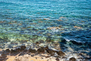 View of the clear turquoise waters of Cala Gonone. Part of the municipality of Dorgali, in the province of Nuoro (Sardinia Island), it is famous for its beaches, tourist resorts and its sea clear and 