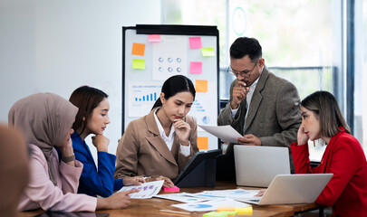 Frustrated upset multiracial business team people sad with bad work result in report, worried of...