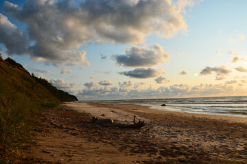 sunset on the beach, cloudly sky