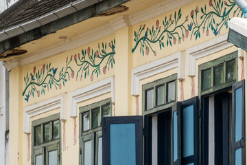 Obraz premium decoration on a wall of an old house in Luang Prabang, Laos