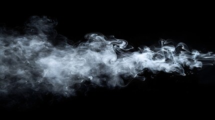 Obraz premium A dynamic swirl of white smoke gracefully trails against a stark black background, creating a sense of movement and mystery.