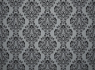 Floral pattern. Vintage wallpaper in the Baroque style. Seamless vector background. Gray and black ornament for fabric, wallpaper, packaging. Ornate Damask flower ornament