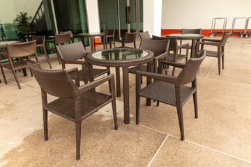 Tables and chairs in a street cafe