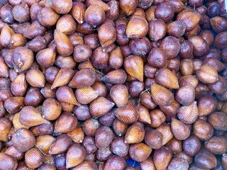 Close up of salak or snake fruit. Display in the market