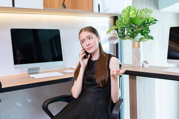 Capture the complexity of office communication with a businesswoman in emotional dialogue on her...