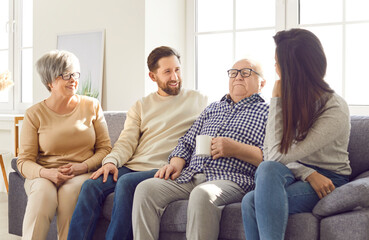 Portrait of happy joyful smiling family of senior old parents and their adult children man and...