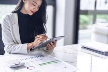 Business woman hand presses on screen digital tablet Online Digital marketing  technology