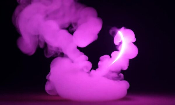 Glowing heart shaped frame in the clouds. 3d render of pink and blue glowing neon heart with smoke. Love concept.