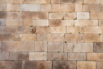 Fototapeta premium Processed collage of ancient yellow block wall texture. Background for banner, backdrop or texture