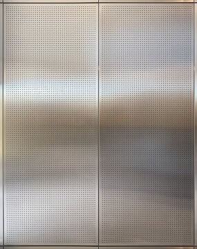 Polished Metallic Surface with Perforated Design - Industrial Texture