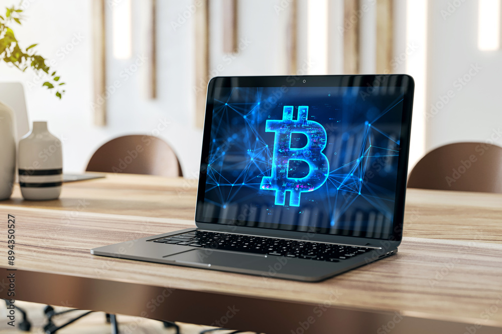 Poster close up of laptop on wooden desk with digital bitcoin sign on blurry background. digital banking, t