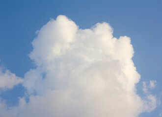 
Blue sky and white puffy clouds