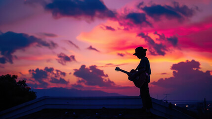 Silhouette of Guitarist at Sunset