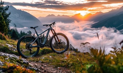 A mountain bike is parked against a stunning backdrop of snowy mountain peaks, representing the adventure and freedom associated with mountain biking in beautiful terrains