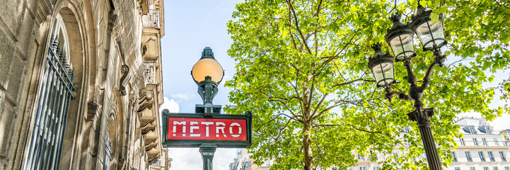 Metro entrance sign at a subway station in Paris, France