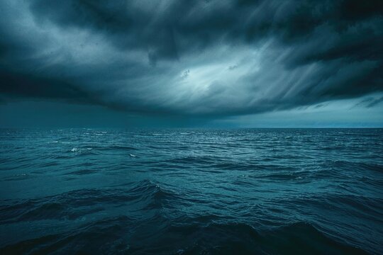 Rough Seas with Stormy Clouds Overhead. Dark, Powerful Nature Image.