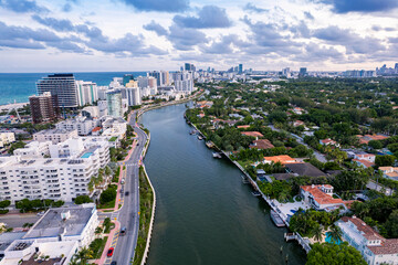 Miami Beach, Florida - Aerial of Indian Creek dividing hotels and houses on the right.