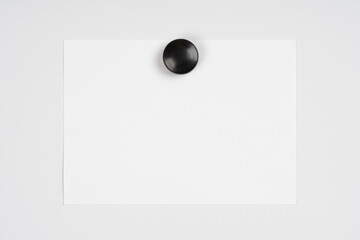 Empty whiteboard (magnetic board) isolated on white. Writes with a marker on a white paper on flip chart. Business, education and office concept.