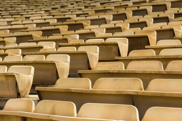 Empty snow-covered stands of the stadium. Beautiful simple AI generated image in 4K, unique.