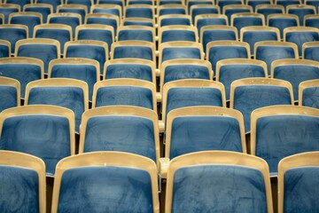 Naklejka premium Empty stands and seats for fans and fans in the open-air stadium. Lack of fans during the pandemic.. Beautiful simple AI generated image in 4K, unique.