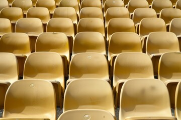 Obraz premium Empty snow-covered stands of the stadium. Beautiful simple AI generated image in 4K, unique.