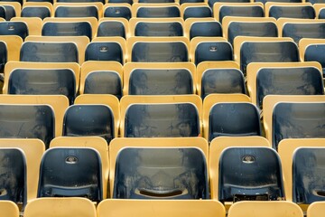 Obraz premium Close-up taken of empty blue stadium seats with no people around. Beautiful simple AI generated image in 4K, unique.