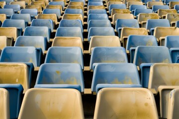 Naklejka premium Empty stands and seats for fans and fans in the open-air stadium. Lack of fans during the pandemic.. Beautiful simple AI generated image in 4K, unique.