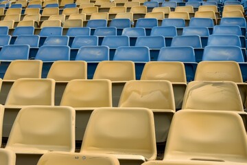 Fototapeta premium Close-up taken of empty blue stadium seats with no people around. Beautiful simple AI generated image in 4K, unique.