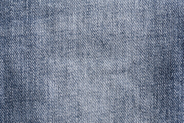 Blue denim jeans texture background. top view.