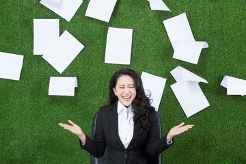 Ms grass business paper thrown into the air