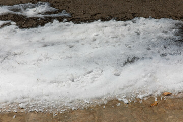 Environmental Hazard: Toxic PFOS Firefighting Foam Spill on Urban Street