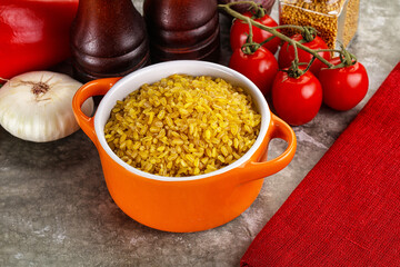 Dry wheat bulgur cereal heap