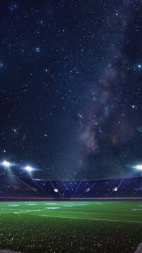 Bright stadium lights reflect under a starry sky cosmos