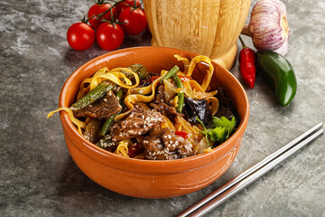 Asian wok with noodle, vegetables and beef