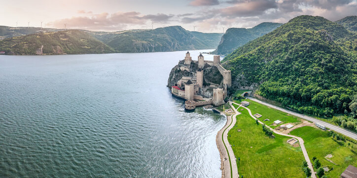 Golubac Fortress in Serbia, a historic landmark overlooking the blue Danube, captured from above on a sunny summer day.