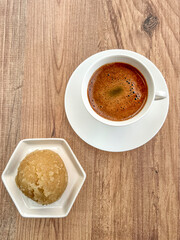 traditional turkish dessert made from semolina and cup of coffee