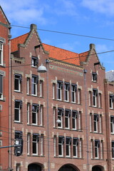 Fototapeta premium Amsterdam Raadhuisstraat Brick Building Facade, Netherlands