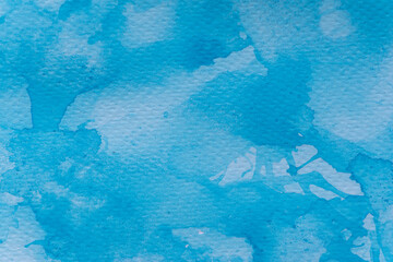青色の水彩絵の具の背景