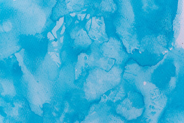 青色の水彩絵の具の背景
