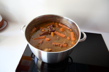 Large pot with cooked lentil stew