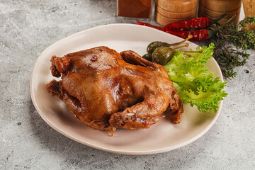 Baked small chicken with spices