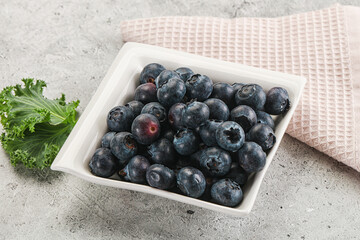 Sweet ripe blueberry on the bowl