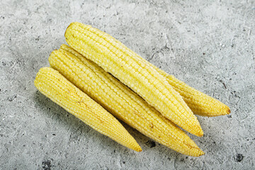 Raw sweet baby corn heap